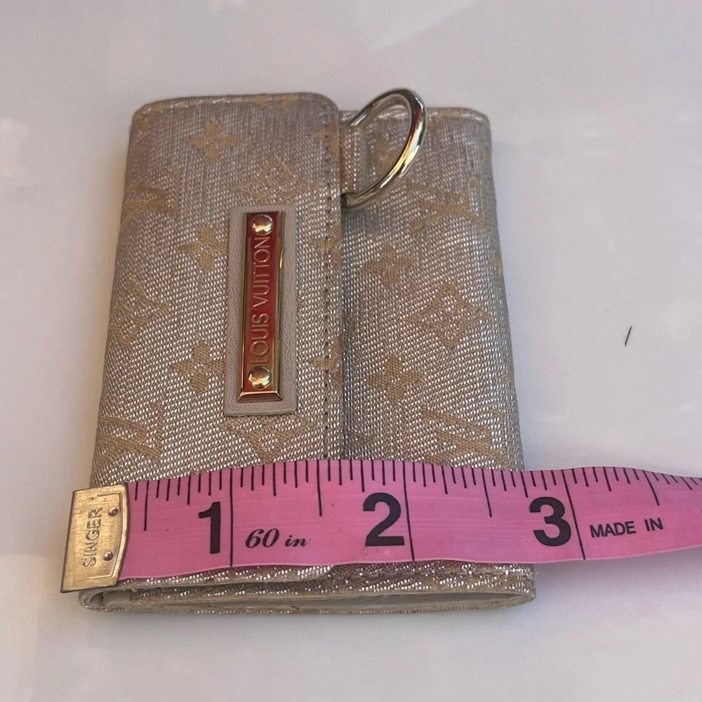 LOUIS VUITTON MINI LIN SHINE MONOGRAM WALLET